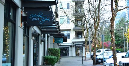 Business store fronts on 103 Ave NE
