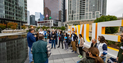 Bellevue Essentials participants are gathered at the City Hall plaza.