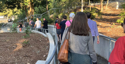 Residents and city leaders walk in BelRed.