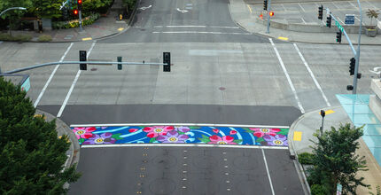 One of the crosswalks at 106th Avenue Northeast and Northeast 10th Street has been painted an artistic design.
