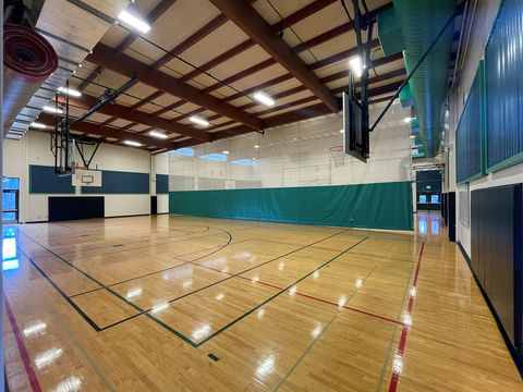 image of inside Tyee Community Gym, with Curtain down, view from front entrance side