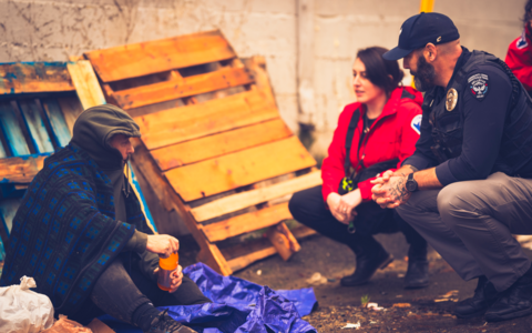Image of CCAT meeting with a community member.