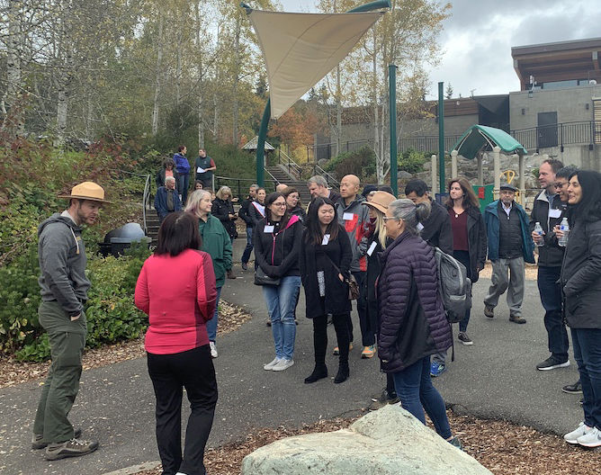 A park ranger meets with the Bellevue Essentials class of 2019 at Lewis Creek Park.