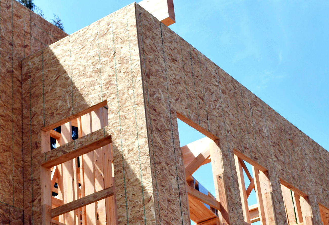 Image of residential construction on a sunny day.