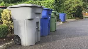 Row of garbage cans