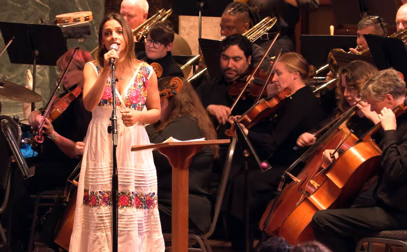 The Lake Washington Symphony Orchestra performs with a woman singing.
