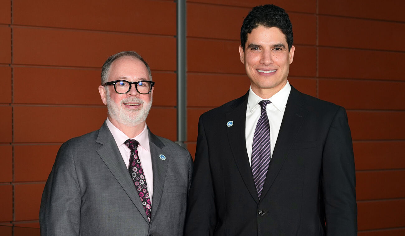 Deputy Mayor Dave Hamilton (left) stands next to Mayor Mo Malakoutian.
