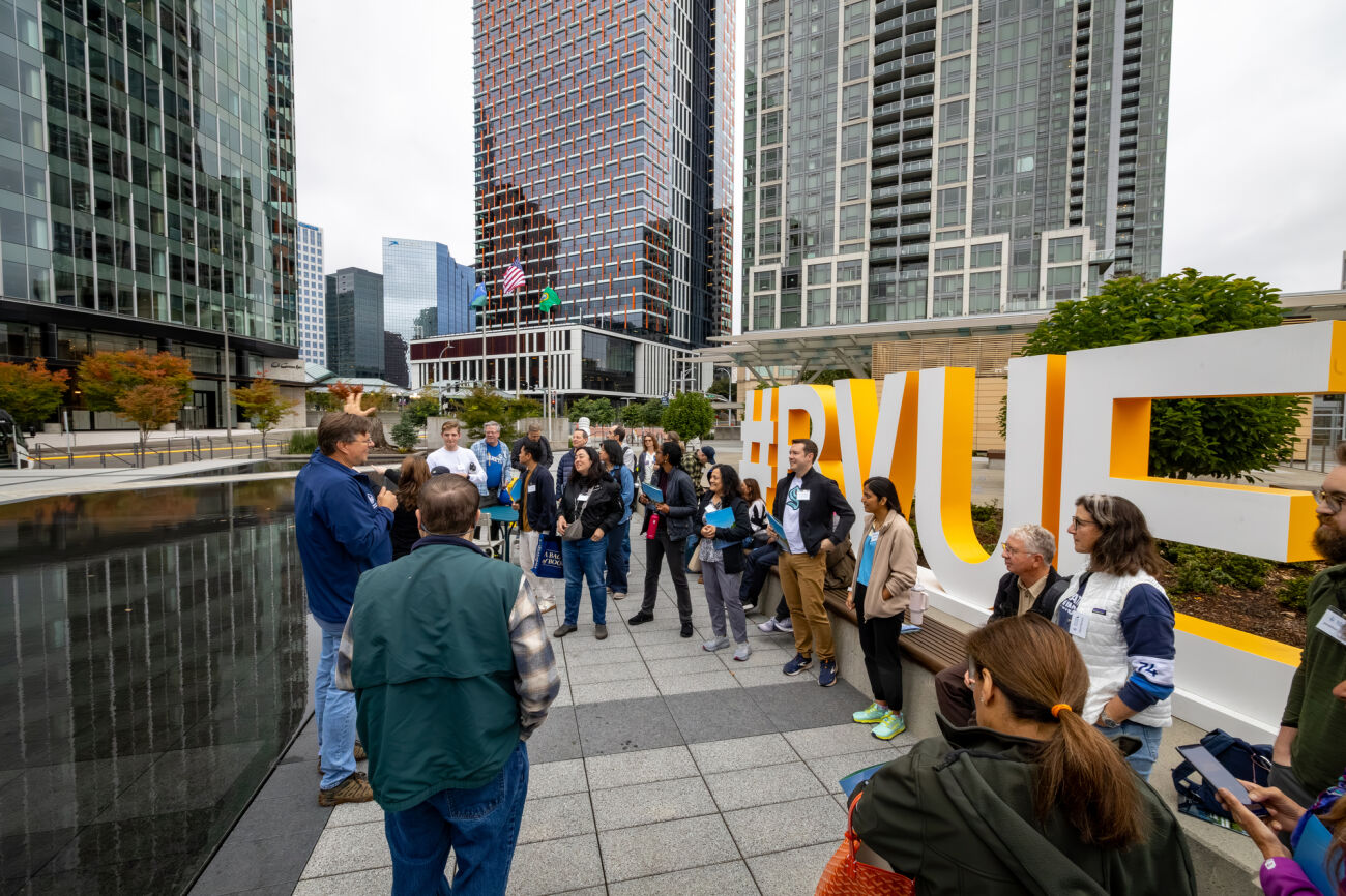Bellevue Essentials participants are gathered at the City Hall plaza.