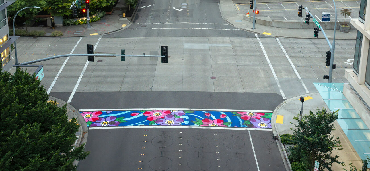 One of the crosswalks at 106th Avenue Northeast and Northeast 10th Street has been painted an artistic design.