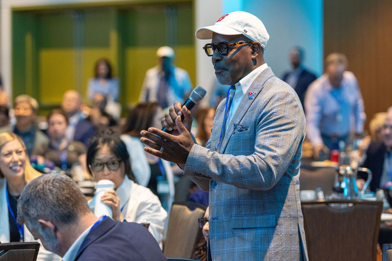 A gentleman speaks at an event.