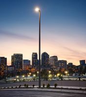 Image of LED streetlights with downtown in background