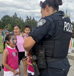 Image of Bellevue Police with community members during the 2025 National Night Out.