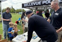 Image of Bellevue Officers with community members during the 2025 National Night Out.