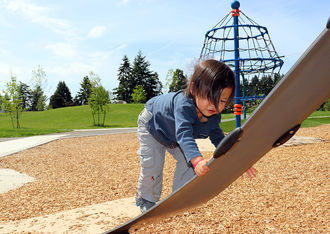 A boy plays at Surrey Downs Park.