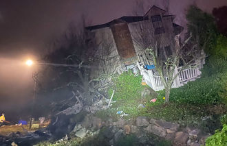 The Jan. 17 landslide pushed a house off its foundation.