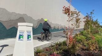 Image of bike rider on Mountains to Sound Greenway