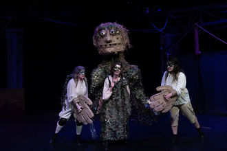 image of three women performing on a stage at Bellevue Youth Theatre