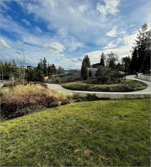 Isan Park grassy meadow and trails