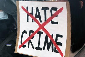 Hate crime text crossed out with red x