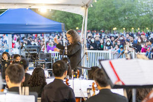 Summer concert in the park, orchestra and oublic
