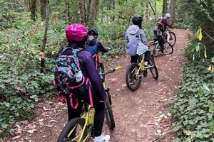 Tracks Adventure Camp biking on trail