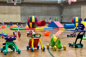 toddler toys on an indoor court