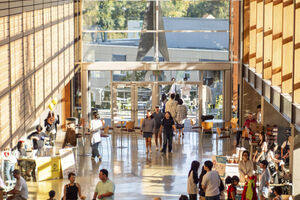 Community members walking around the Bellevue City Hall Concourse