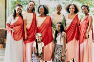 a group of women smiling at the camera
