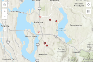 A digital map displays speed safety camera locations marked with red dots in the Bellevue area, with surrounding cities and highways labeled.