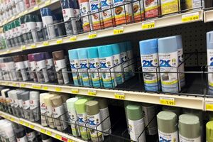 Photo shows spray paint in a store shelf display
